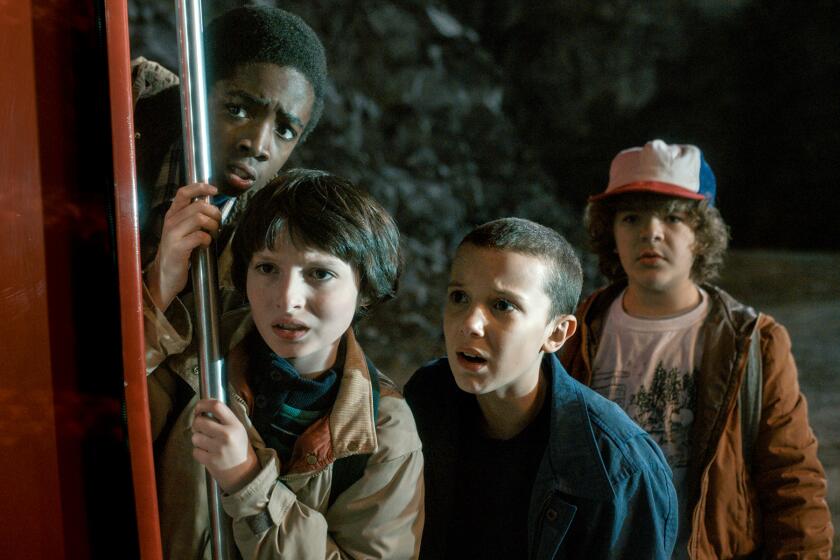 Caleb McLaughlin, left, Finn Wolfhard, Millie Bobby Brown and Gaten Matarazzo in "Stranger Things" on Netflix.