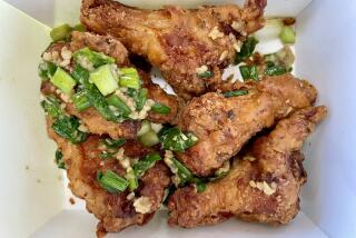 An order of Vietnamese garlic butter chicken wings from Mama Hieu's in Westminster.