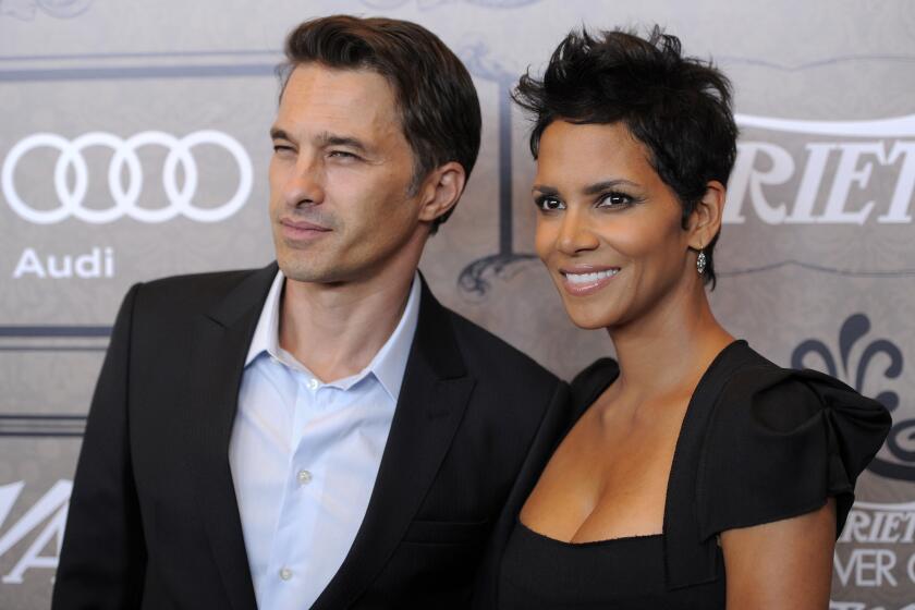 Halle Berry and her ex-husband Olivier Martinez pose together at Variety’s 2012 Power of Women event in Beverly Hills, Calif.