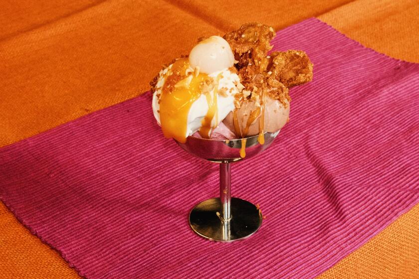 Chef Justin Pichetrungsi's ice cream sundae, with fried bananas and a fish sauce caramel to add some umami at the Los Angeles Times Test Kitchen in El Segundo, CA on Thursday, May 16, 2024.