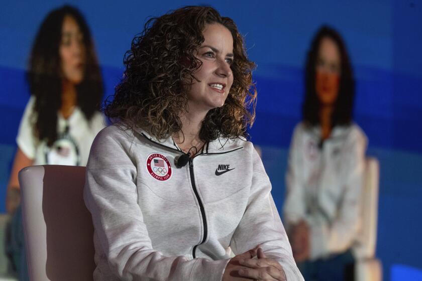 Jessica Bartley, senior director of psychological services at USOPC, during a press conference