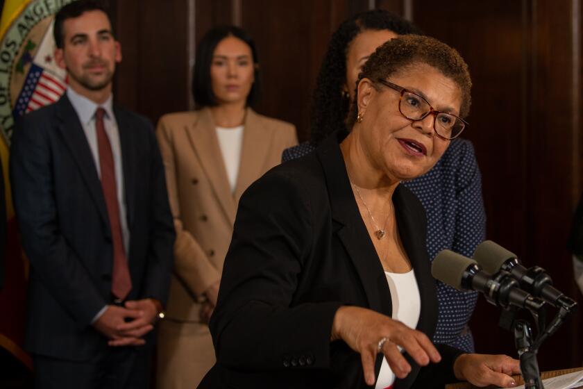 LOS ANGELES, CA - APRIL 18: Los Angeles Mayor Karen Bass, accompanied with her team, presents her first City budget during a press conference at City Hall on Tuesday, April 18, 2023 in Los Angeles, CA. (Irfan Khan / Los Angeles Times)