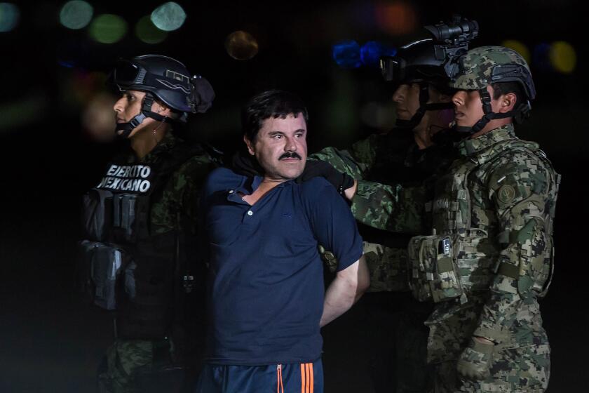 MEXICO CITY, MEXICO - JANUARY 8: Joaquin Guzman Loera, also known as "El Chapo" is transported to Maximum Security Prison of El Altiplano in Mexico City, Mexico on January 08, 2016. Guzman Loera, leader of Mexico's Sinaloa drug Cartel, was considered the Mexican most-wanted drug lord. Mexican marines captured "El Chapo" on Friday in Sinaloa, North of Mexico. (Photo by Daniel Cardenas/Anadolu Agency/Getty Images)