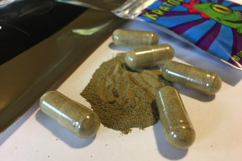 Kratom capsules are displayed in Albany, N.Y., by federal health authorities in 2017.