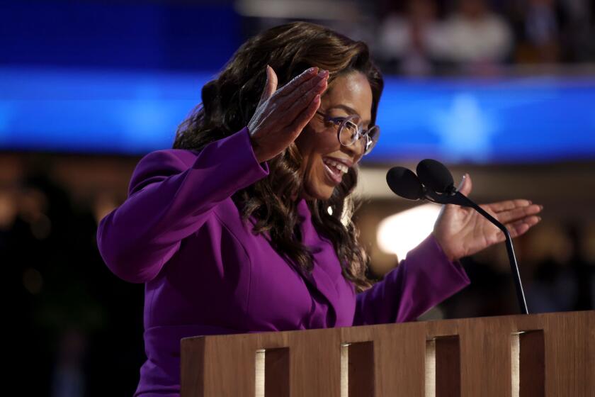 DNC CHICAGO, IL AUGUST 21, 2024 - Oprah Winfrey speaks during the Democratic National Convention Wednesday, Aug. 21, 2024, in Chicago. (Robert Gauthier/Los Angeles Times)